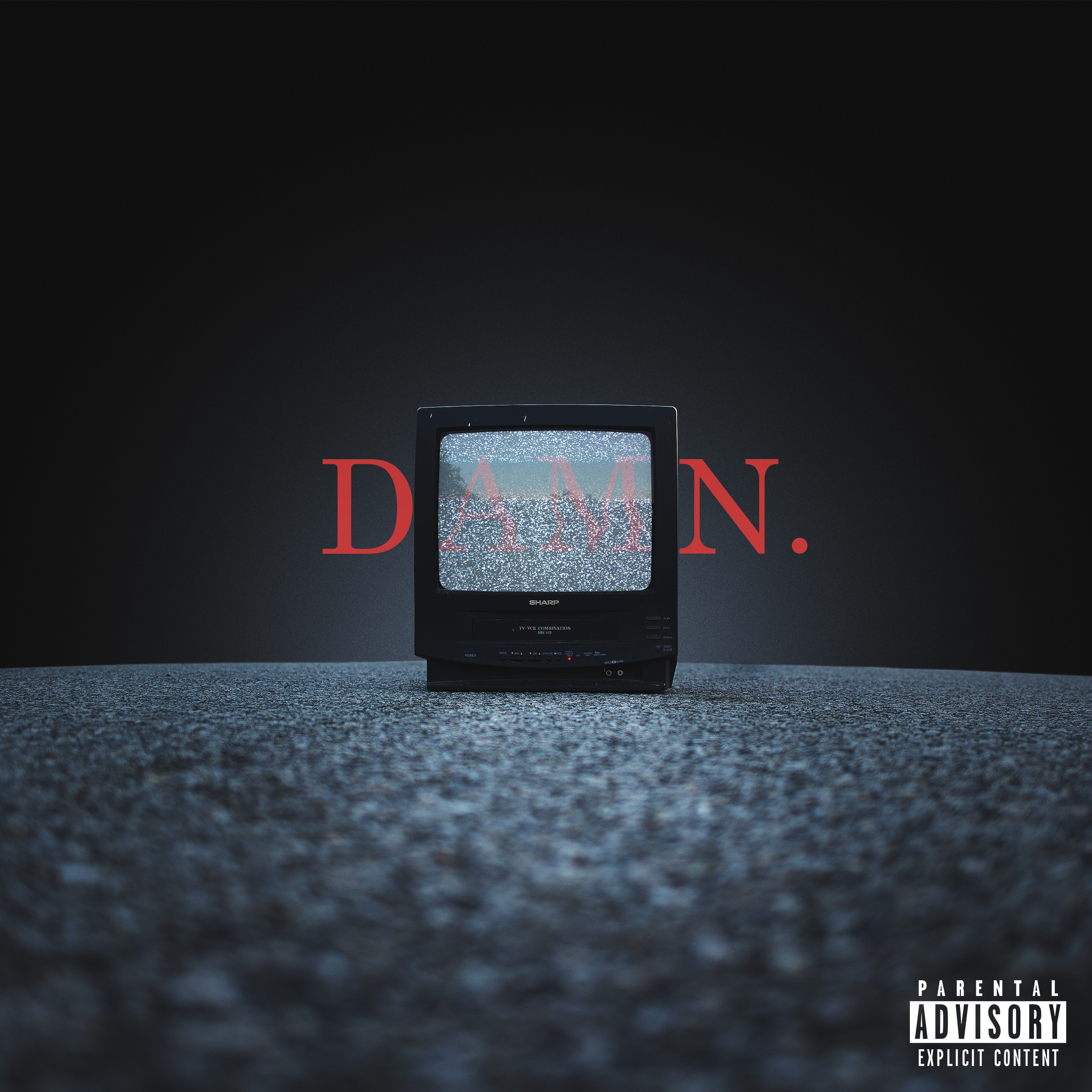 TV on a street pavement in the style of an album cover. Text reads: 'DAMN.'.